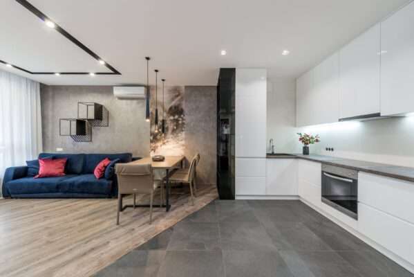 interior of modern apartment with living room and kitchen zone