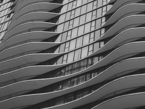 Chicago multifamily architecture illustrating refinance underwriting and owner hold-versus-sell analysis