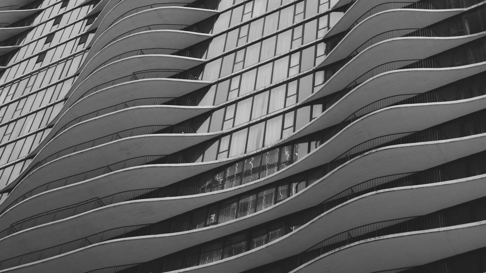 Chicago multifamily architecture illustrating refinance underwriting and owner hold-versus-sell analysis